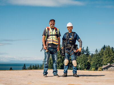 Two men in construction safety attire