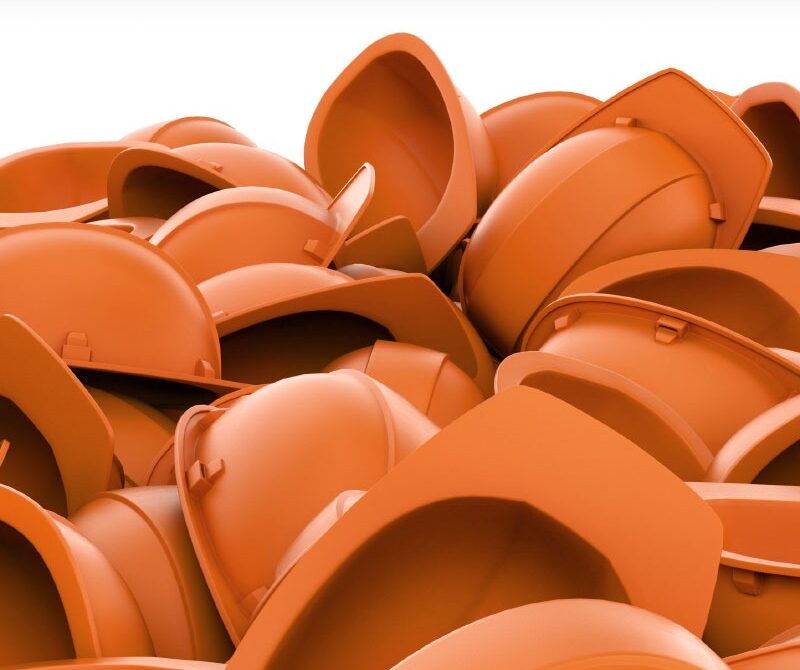 Pile or orange hard hats