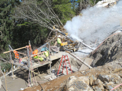 Scaffolding and workers drilling micropiles