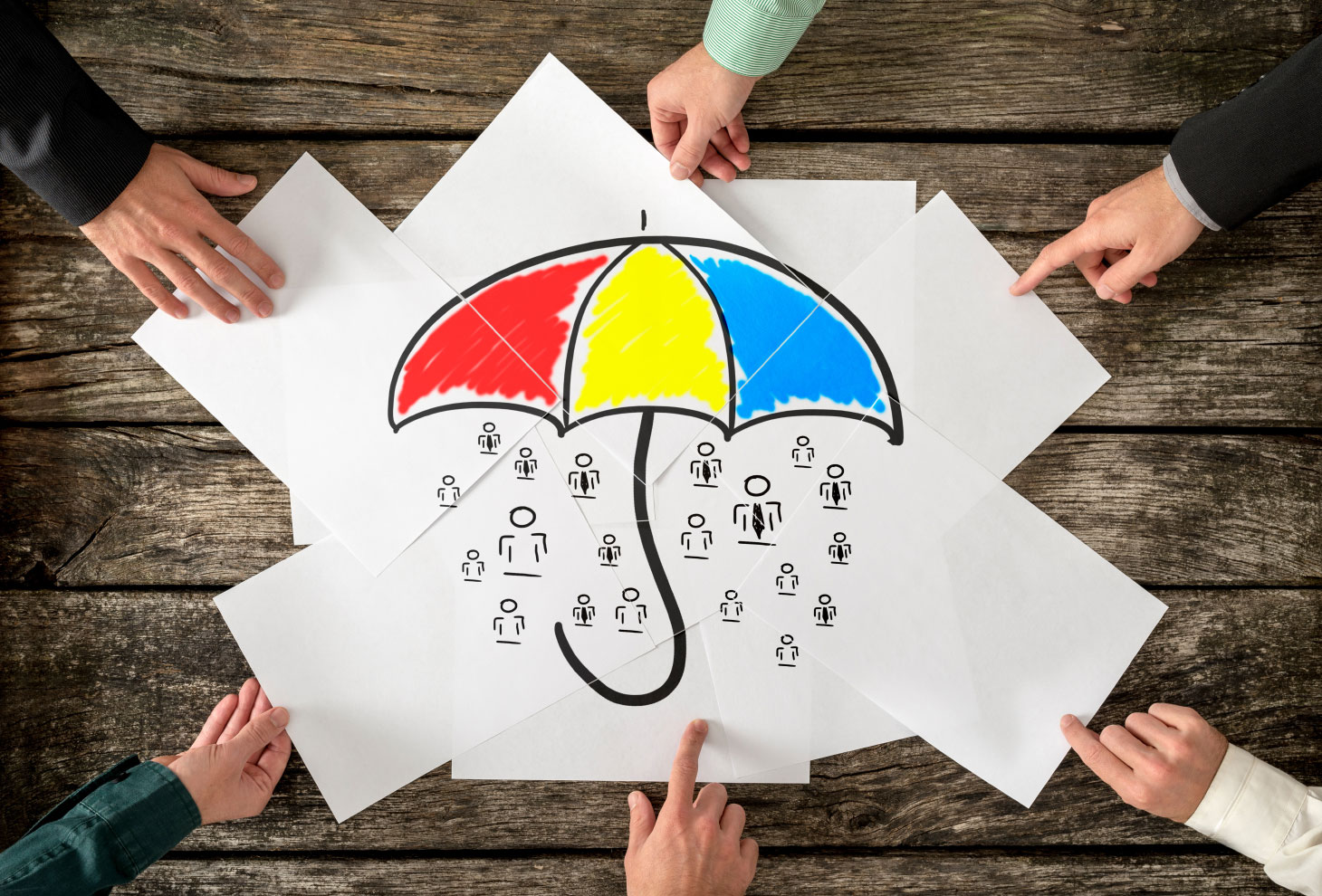 Pages placed together to form image of colourful umbrella