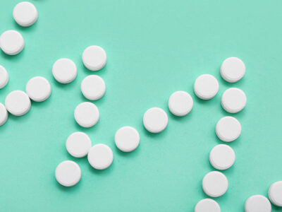 Pills lined up in row