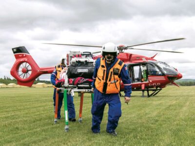 Unloading gear from a START helicopter
