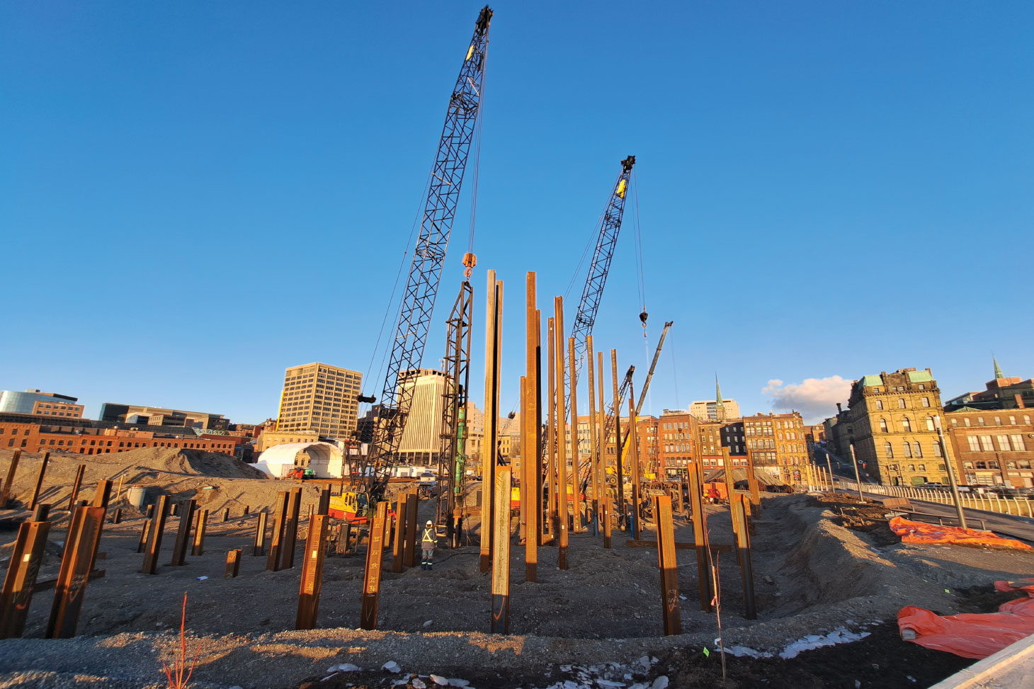 Installed piles jutting out of ground