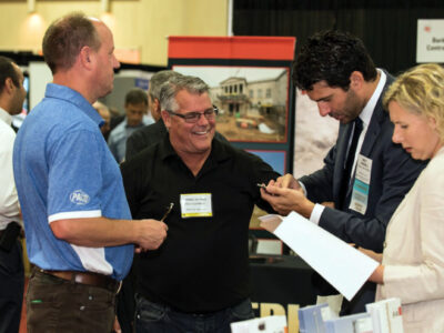 Vendors chatting at conference