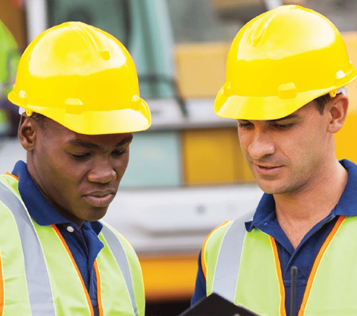 Two men in yellow hardhats