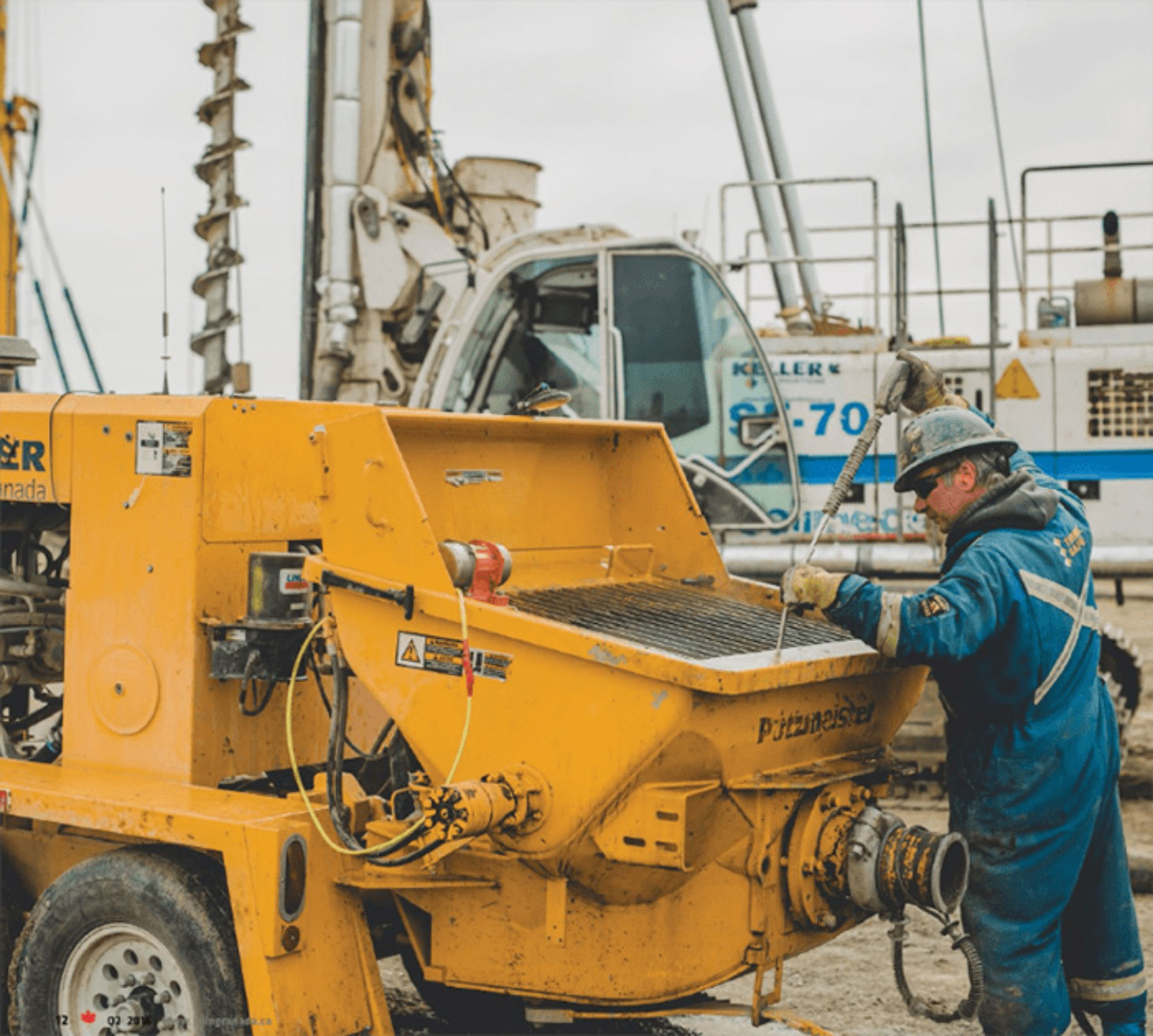 Man working on large piece of equipment