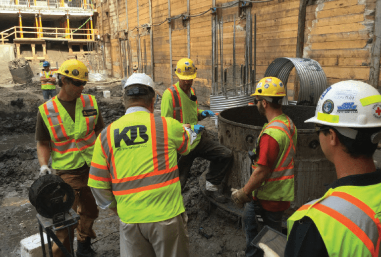 KB International employees working on a job site