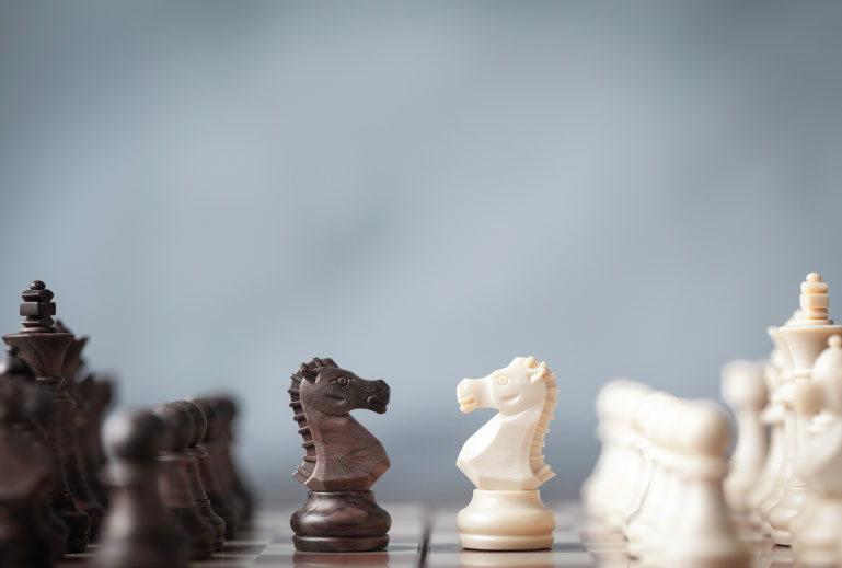 Chess pieces on a chess board