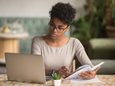 Woman at desk with laptop