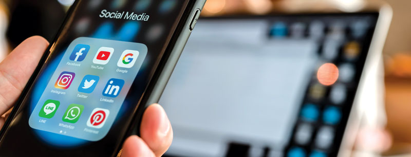 Looking at social media apps on mobile device