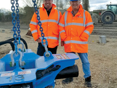 Rick Hennessey and Jack Bonomi alongside a NPC Multibar cropper