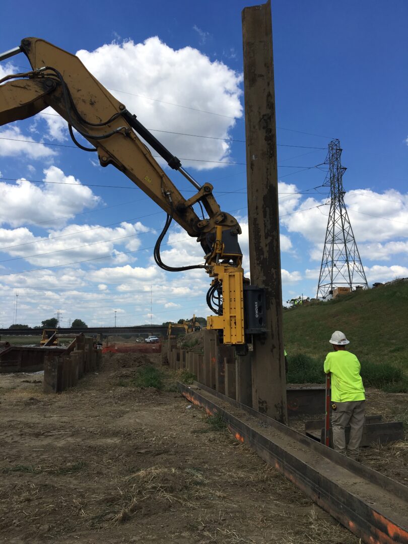 Engineer supervising equipment operation.