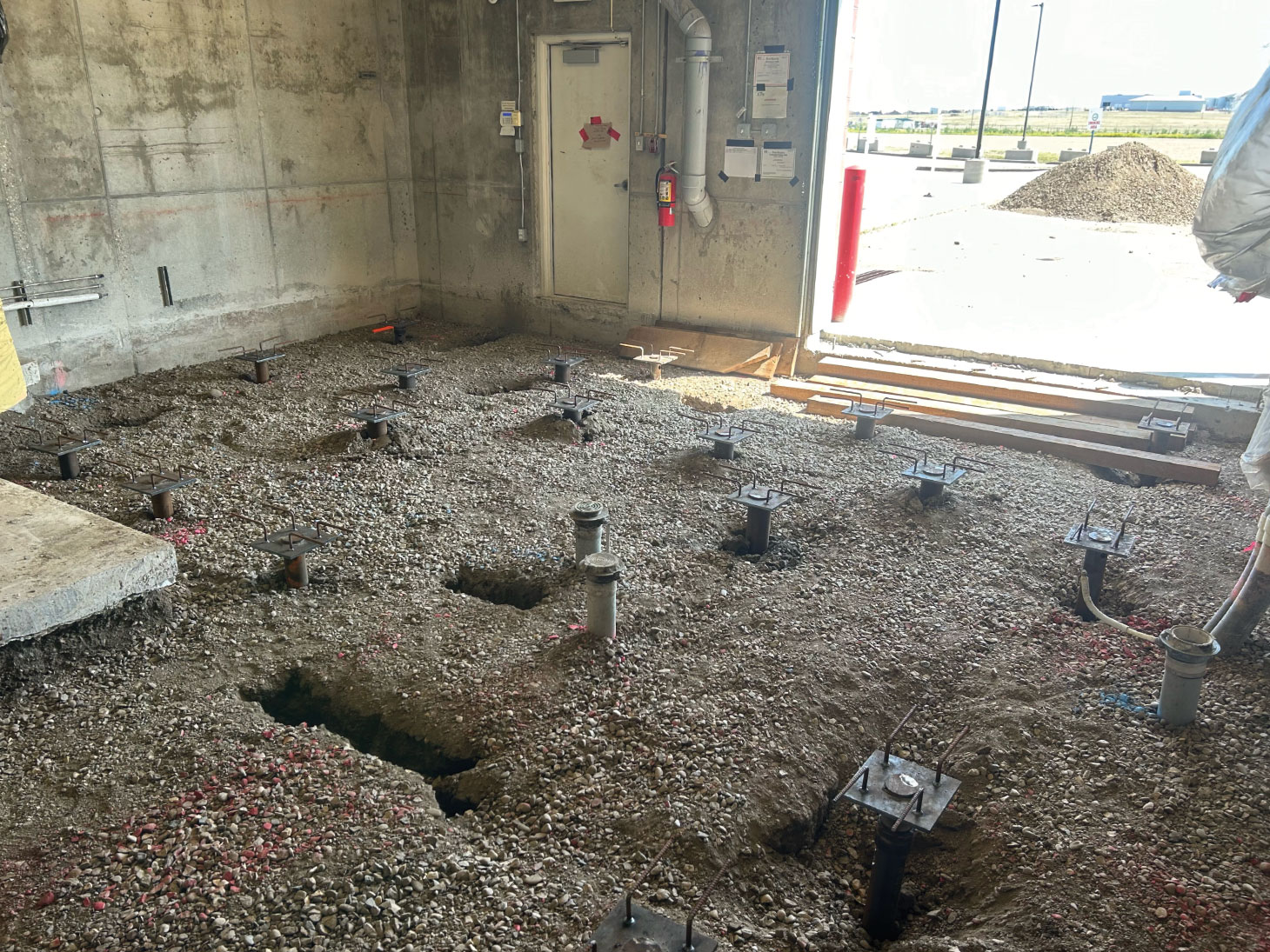 Helical Piles installed by Edmonton Screw Pile Pros at Centennial Arena, Brooks