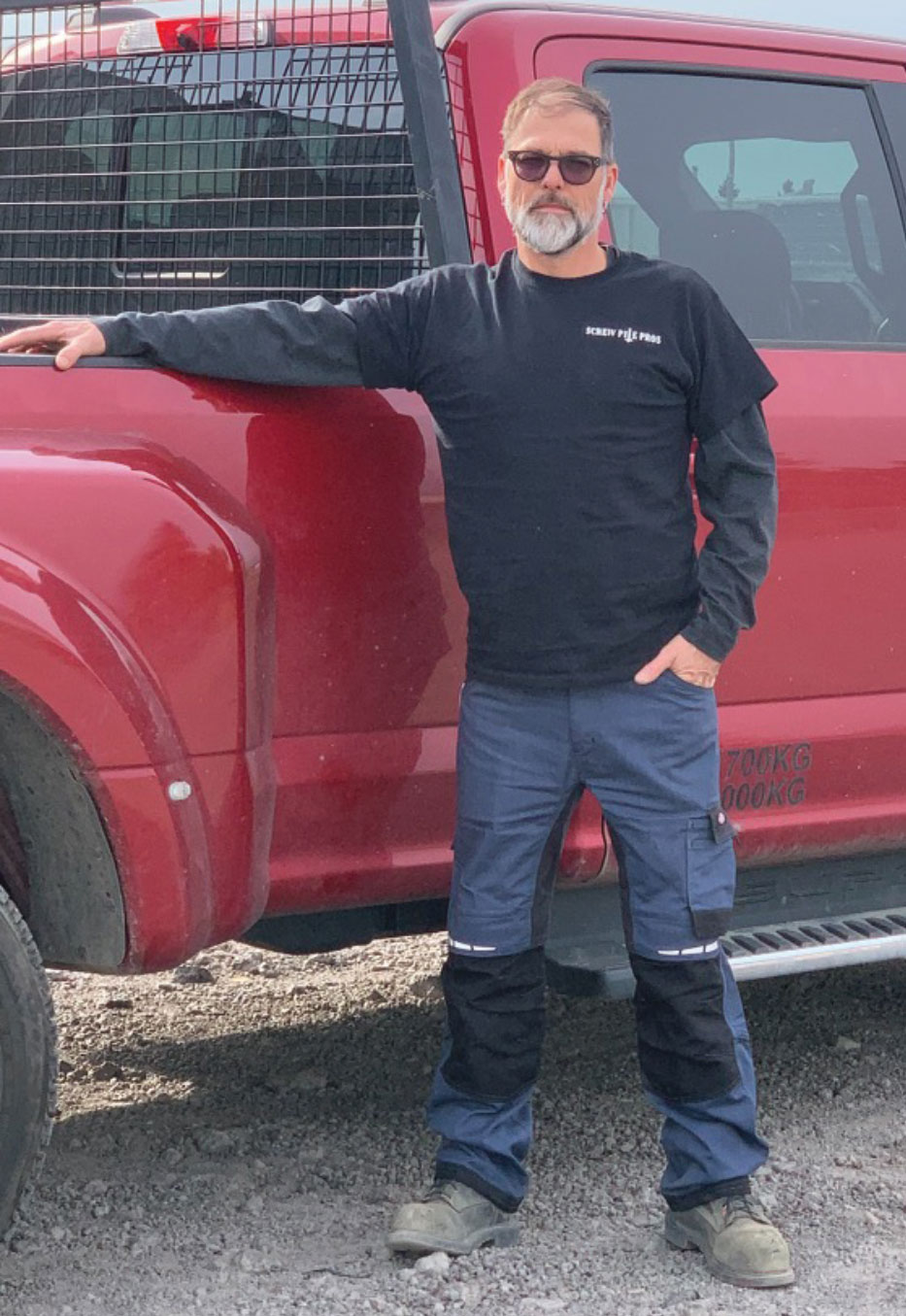 Mat Bergevin leaning against pickup truck