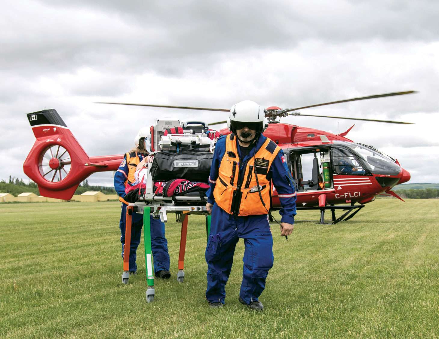 Unloading gear from a START helicopter