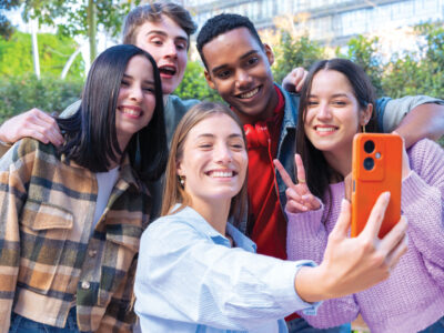 Group of young adults, posing for selfie