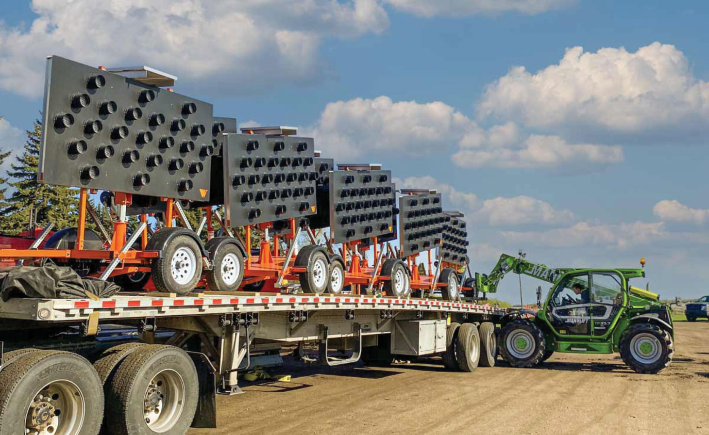 Loading signs on bed of truck