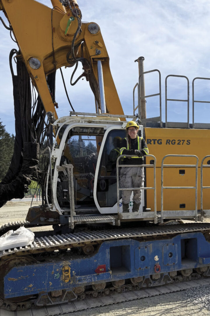 Jessica standing on deck of RTG-series pile driving equipment