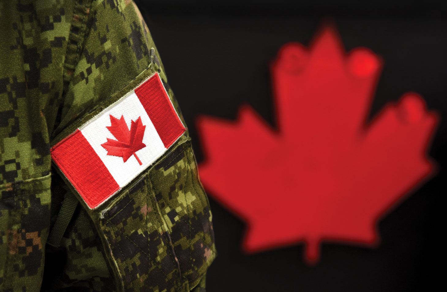 Canadian flag patch on military uniform