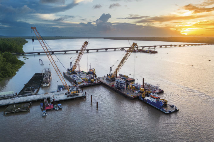 Aerial view of cranes on barge