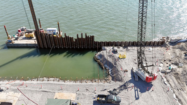 Aerial view of combi wall foundation installation at the Port of Trois-Rivières
