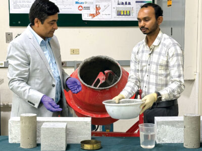 Bishnu Acharya and Ravi Patel at display booth