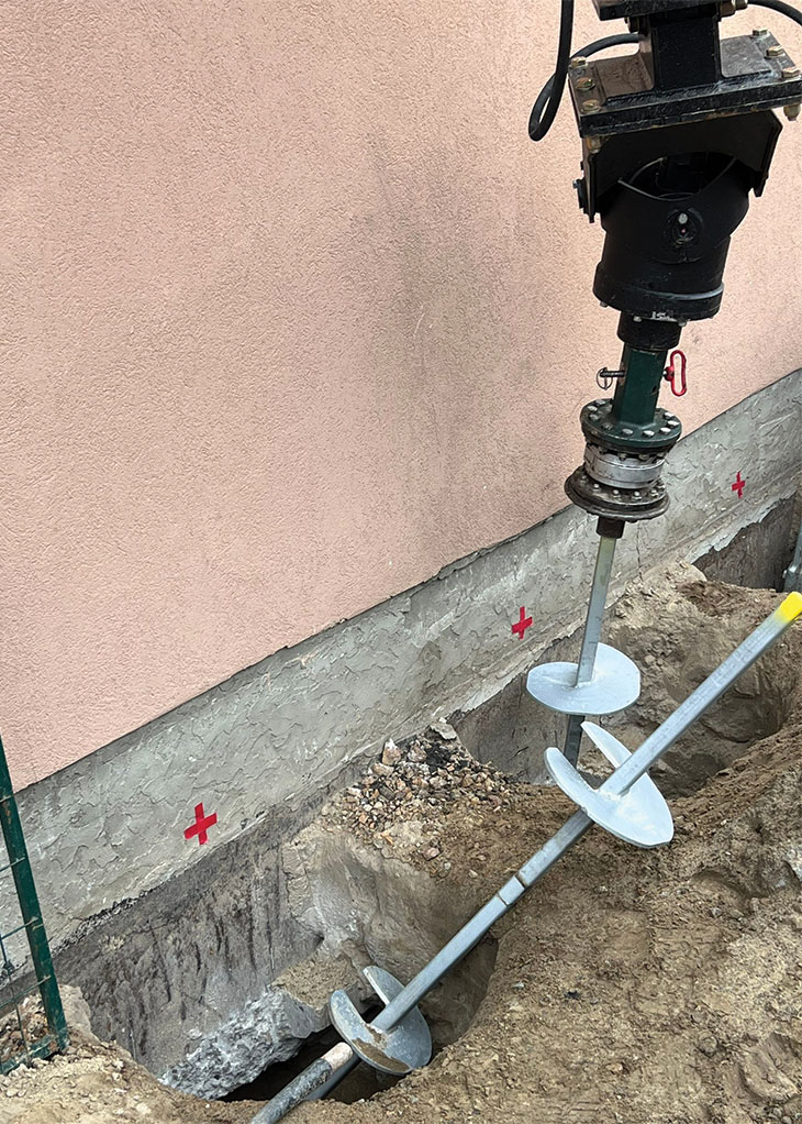 Installing piles on job site