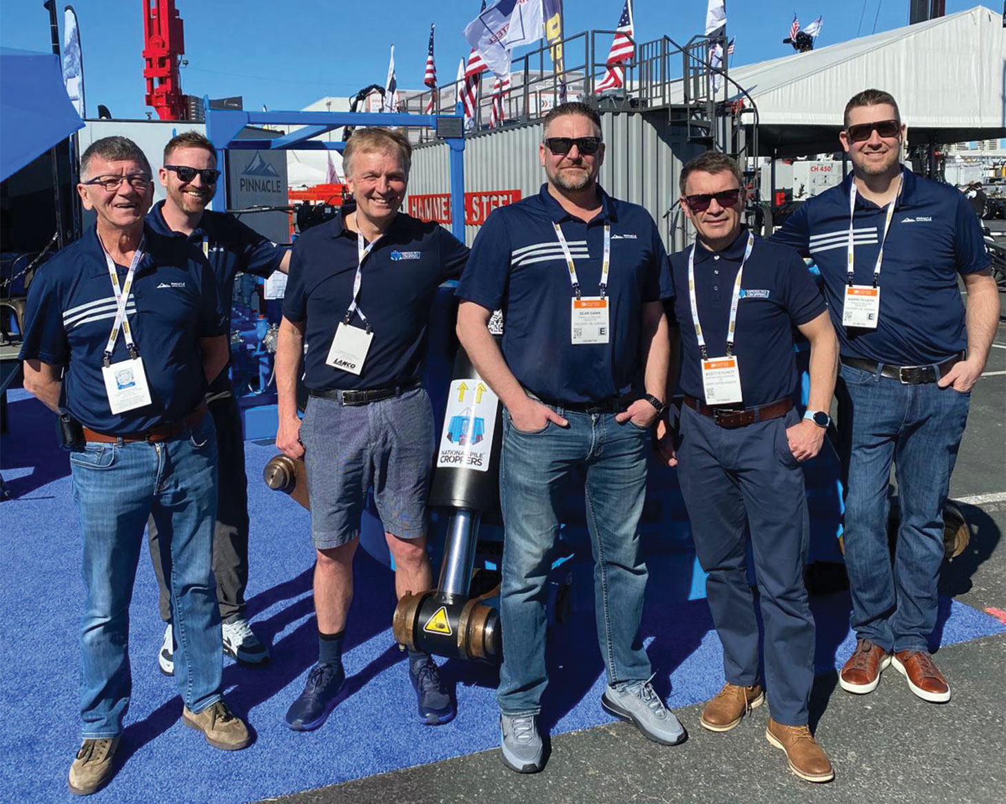 Group photo outside CONEXPO-CON/AGG