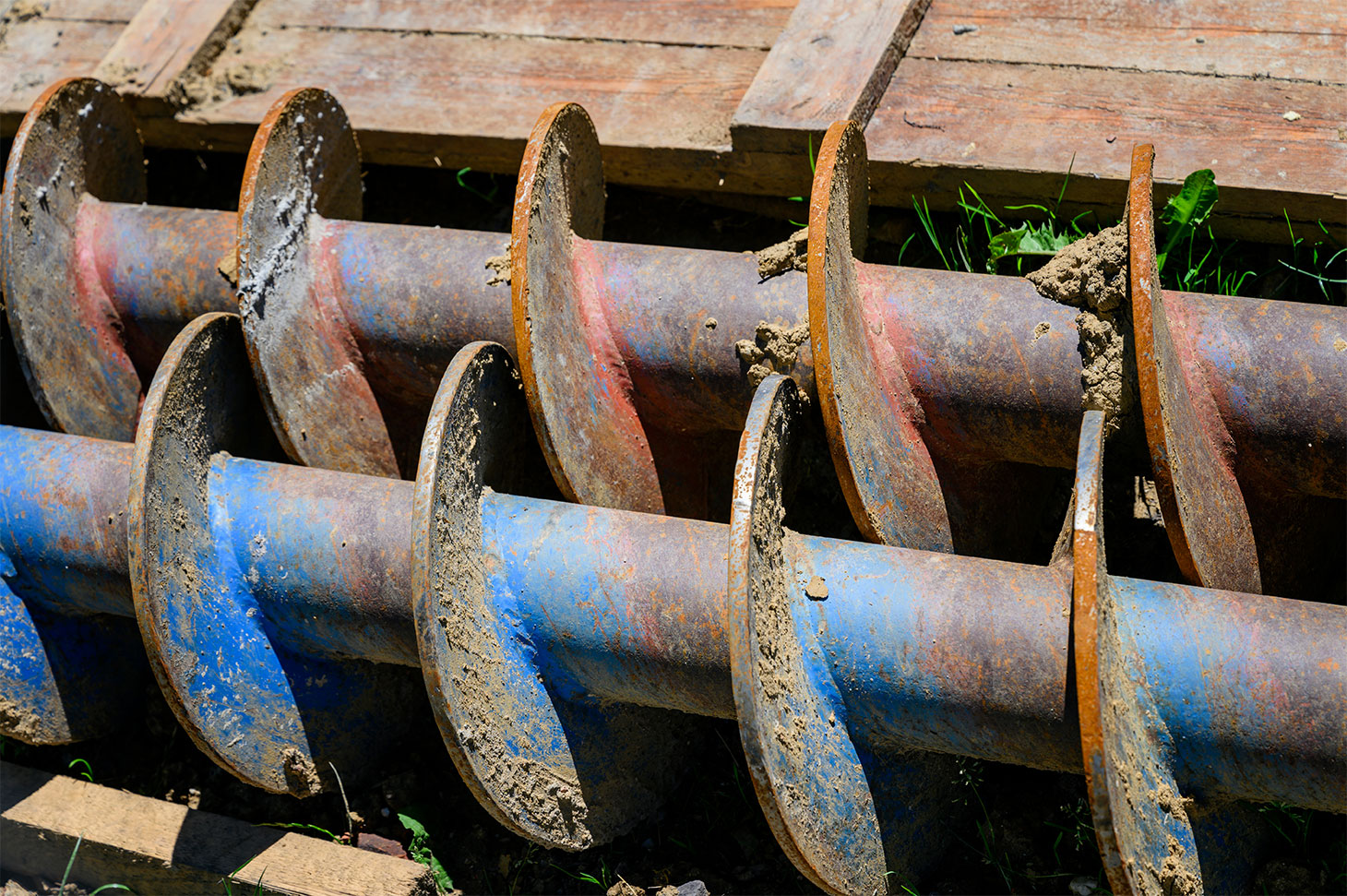 Large drill lying on the ground