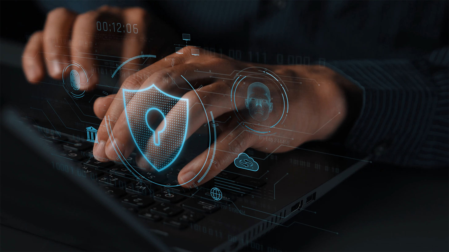 Hands on keyboard with cyber security HUD graphic overlay