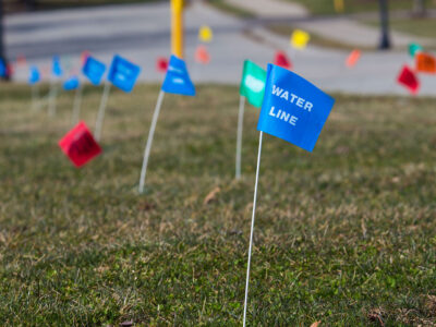 Utilities location flags marking underground lines