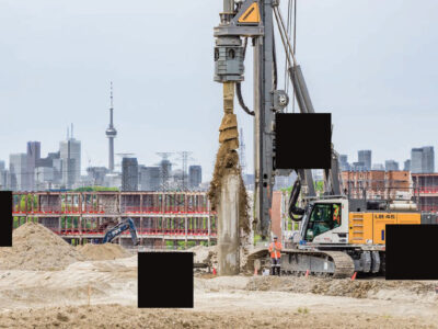 Machinery and job site with black squares signifying blind spots