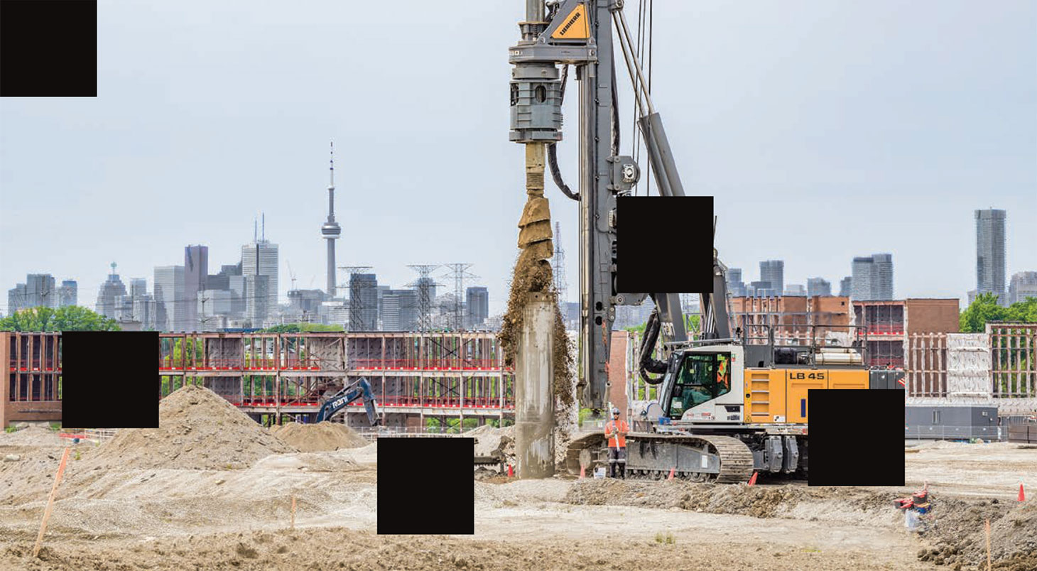 Machinery and job site with black squares signifying blind spots