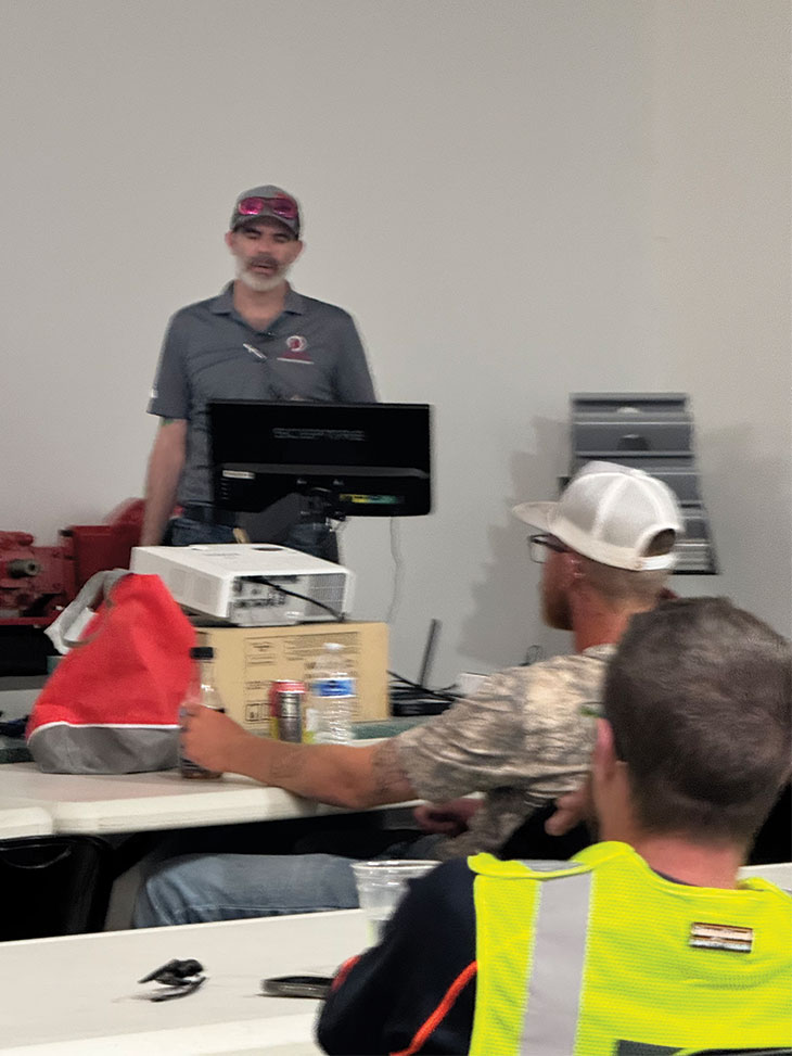 Denis Ambio teaching class