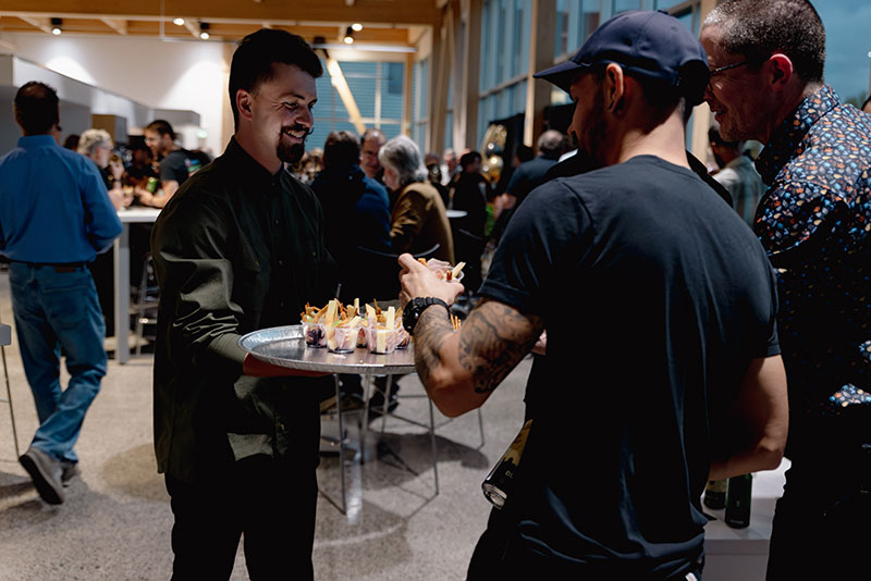 Guests enjoying beverages and food