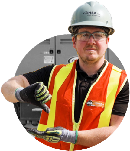 Man in safety gear demonstrating hand/arm signals