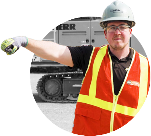 Man in safety gear demonstrating hand/arm signals