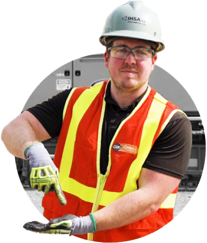 Man in safety gear demonstrating hand/arm signals