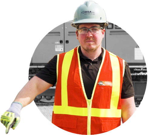Man in safety gear demonstrating hand/arm signals