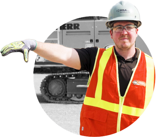 Man in safety gear demonstrating hand/arm signals