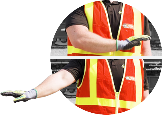 Man in safety gear demonstrating hand/arm signals